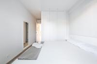 A bed or beds in a room at Tango