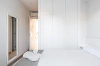 A bed or beds in a room at Tango
