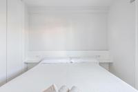 A bed or beds in a room at Tango