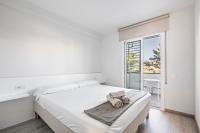 A bed or beds in a room at Tango