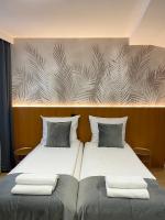 Posteľ alebo postele v izbe v ubytovaní Garbarska 22 Aparthotel
