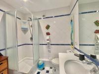 a bathroom with a shower and a sink and a toilet at La Marjolette by Welcome to Cannes in Cannes