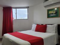 Postel nebo postele na pokoji v ubytování Hotel Olimpo