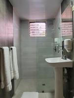 Koupelna v ubytování Hotel Olimpo