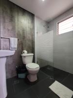 Koupelna v ubytování Hotel Olimpo
