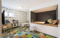 Televízia a/alebo spoločenská miestnosť v ubytovaní 5* Luxury Villa Michele