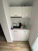 Kuchyň nebo kuchyňský kout v ubytování Coral Boutique Apartments