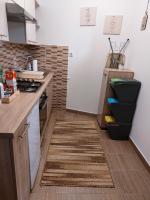 Kuchyňa alebo kuchynka v ubytovaní Apartman SAN