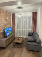 Area soggiorno di Apartament l&acirc;ng&#x103; VIVO