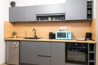 Kuchyň nebo kuchyňský kout v ubytování Apartmenthaus Oborishte