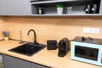 Kuchyň nebo kuchyňský kout v ubytování Apartmenthaus Oborishte