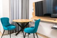 TV a/nebo společenská místnost v ubytování Apartmenthaus Oborishte