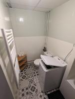 a small bathroom with a toilet and a sink at Ton Petit Studio - Le 62 - Coeur de Ville in Mulhouse
