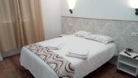 SG ROOMSにあるベッド