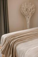 Posteľ alebo postele v izbe v ubytovaní Lotus - Unalome Villas