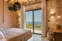 Posteľ alebo postele v izbe v ubytovaní Adrias Villa Kefalonia