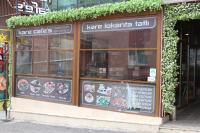 een winkel voor een restaurant met een bord bij Center Room Otel in Yenimahalle