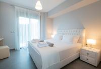 Posteľ alebo postele v izbe v ubytovaní Bellevue Villas with private pool