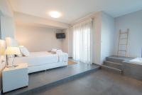 Posteľ alebo postele v izbe v ubytovaní Bellevue Villas with private pool