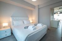 Posteľ alebo postele v izbe v ubytovaní Bellevue Villas with private pool