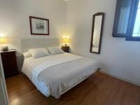 Postel nebo postele na pokoji v ubytování Apartamento céntrico Plaza del Salvador