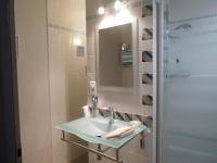 a bathroom with a sink and a mirror at Guestroom Arbigny-sous-Varennes, 2 pièces, 4 personnes - FR-1-611-72 