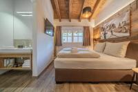 Posteľ alebo postele v izbe v ubytovaní Der Ortnerhof - Hotel & Reiterhof