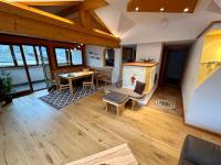 A seating area at Alpenapart Singer - contactless check-in