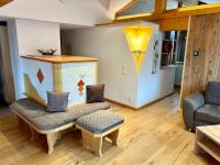 A seating area at Alpenapart Singer - contactless check-in