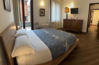 Posteľ alebo postele v izbe v ubytovaní Grimaldi Apartments Cannaregio