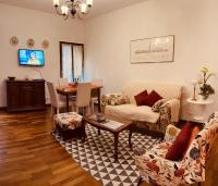 Televízia a/alebo spoločenská miestnosť v ubytovaní Grimaldi Apartments Cannaregio