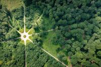 an aerial view of a windmill in the middle of a forest at “Chez Mily“ Joli petit duplex plein centre Villers Cotteret in Villers-Cotterêts
