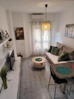 Posedenie v ubytovaní Acogedor apartamento cerca del centro histórico de Málaga