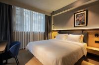 Chengdu Desti Youth Park Hostel TaiKooLiにあるベッド