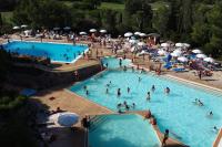 a group of people in a swimming pool at L&#39;écrin du Cap Esterel in Saint-Raphaël