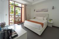 Postel nebo postele na pokoji v ubytování Silver Oasis Maldives