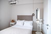 Posteľ alebo postele v izbe v ubytovaní Cos Seafront Apartments