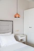 Posteľ alebo postele v izbe v ubytovaní Cos Seafront Apartments