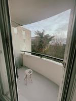 Balkon lub taras w obiekcie Appartement Proche U Arena et La Défense