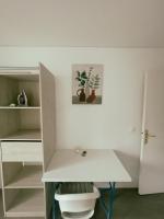 Plan piętra w obiekcie Appartement Proche U Arena et La Défense