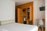 Postel nebo postele na pokoji v ubytování Hotel Dabeleira