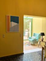 A seating area at Avgi Garden House Chania with private entrance