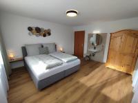 Posteľ alebo postele v izbe v ubytovaní Carina's Apartment
