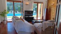 Telewizja i/lub zestaw kina domowego w obiekcie Villa Puerto Adriano
