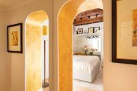 A bed or beds in a room at Giulia Luxury Suite