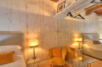 A bed or beds in a room at Giulia Luxury Suite