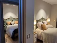 S&auml;ng eller s&auml;ngar i ett rum p&aring; Maison Baudry Bethune - Bedroom