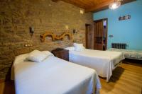 Posteľ alebo postele v izbe v ubytovaní Casa Rural Anita