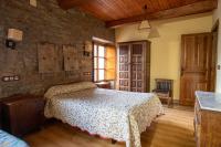 Posteľ alebo postele v izbe v ubytovaní Casa Rural Anita