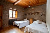Posteľ alebo postele v izbe v ubytovaní Casa Rural Anita